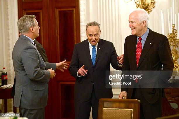 House Majority Leader Kevin McCarthy , Senate Minority Leader Chuck Schumer and Majority Whip John Cornyn attend a reception hosted by President...