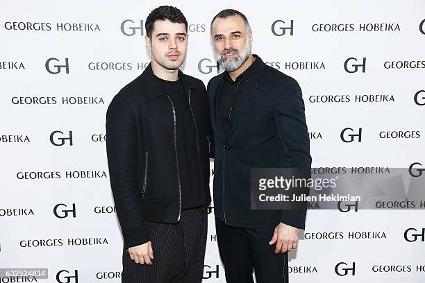 Designer Georges Hobeika is pictured with his son Jad Hobeika at the end of his Haute Couture Spring Summer 2017 show as part of Paris Fashion Week...