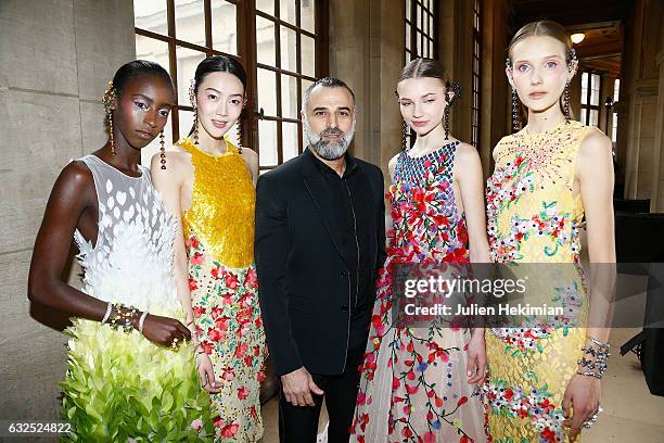 Designer Georges Hobeika is pictured with models at the end of his Haute Couture Spring Summer 2017 show as part of Paris Fashion Week on January 23,...