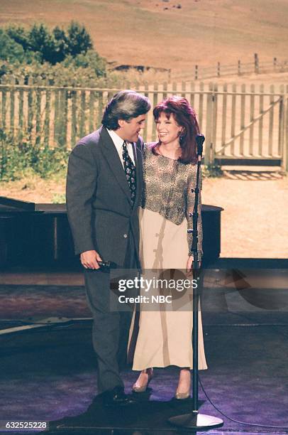 Episode 436 -- Pictured: Host Jay Leno greets singer Patty Loveless on April 13, 1994 --