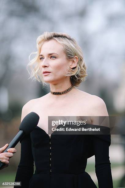Diane Kruger wears a black dress, and attends the Christian Dior Haute Couture Spring Summer 2017 show as part of Paris Fashion Week, at the Rodin...