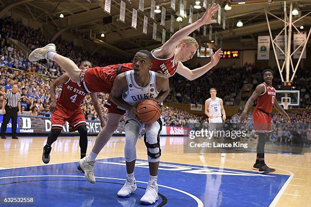 Maverick Rowan of the North Carolina State Wolfpack fouls Harry Giles of the Duke Blue Devils at Cameron Indoor Stadium on January 23, 2017 in...