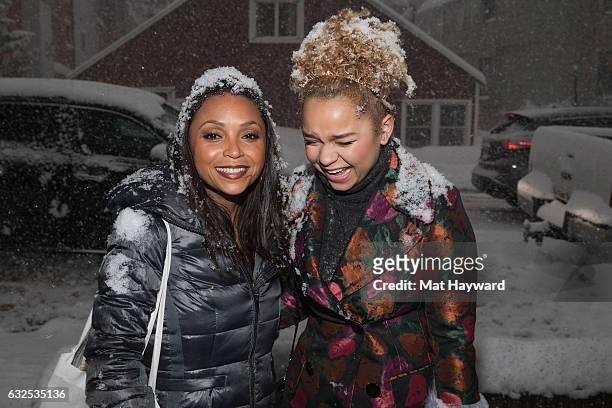Danielle Nicolet and Rachel Crow pose for a photo in the snow during the Sundance Film Festival on January 23, 2017 in Park City, Utah.