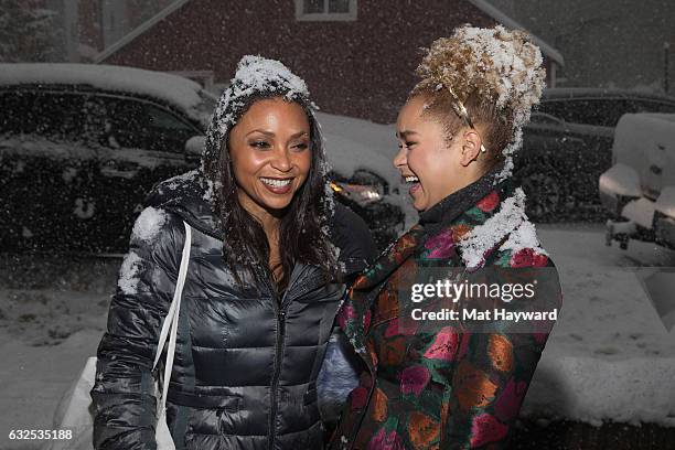 Danielle Nicolet and Rachel Crow pose for a photo in the snow during the Sundance Film Festival on January 23, 2017 in Park City, Utah.