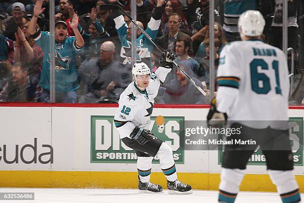 Patrick Marleau of the San Jose Sharks celebrates after scoring his fourth goal of the night against the Colorado Avalanche at the Pepsi Center on...