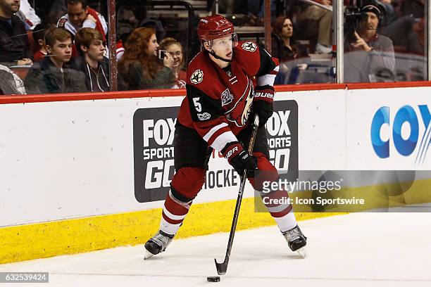 Arizona Coyotes defenseman Connor Murphy looks to pass during the NHL hockey game between the Florida Panthers and the Arizona Coyotes on January 23,...