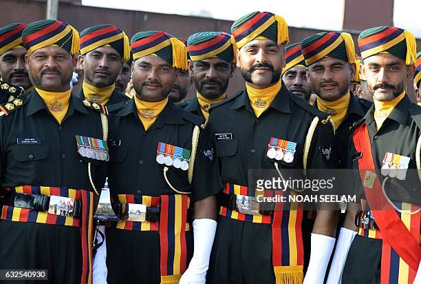 Members of the Dogra Regiment of an infantry unit of the Indian Army with special mustaches pose during a full dress rehearsal for the Indian...