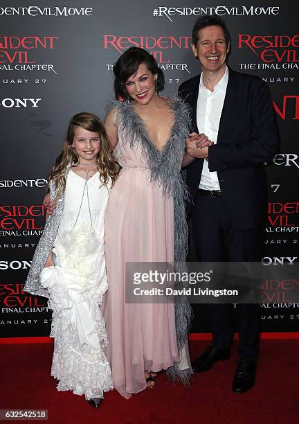 Actress Milla Jovovich, husband director Paul W. S. Anderson and daughter Ever Gabo Anderson attend the premiere of Sony Pictures Releasing's...