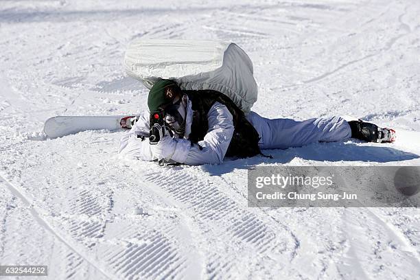 South Korean marine participate in the winter military training exercise with South Korean soldiers on January 24, 2017 in Pyeongchang-gun, South...