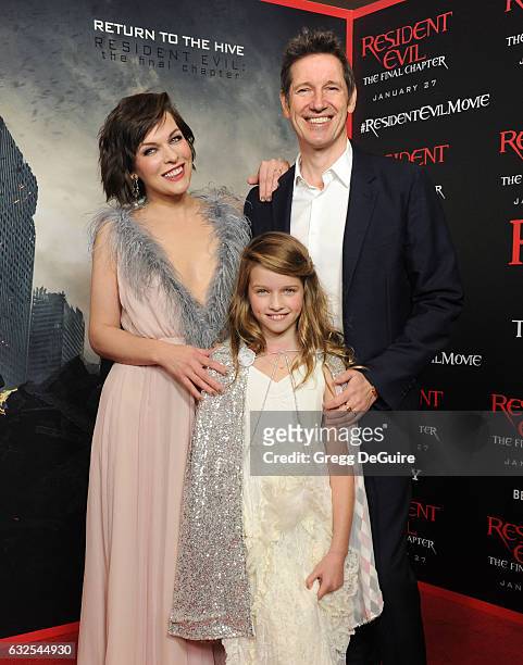 Actress Milla Jovovich, husband/director Paul W.S. Anderson and daughter Ever Gabo Anderson arrive at the premiere of Sony Pictures Releasing's...