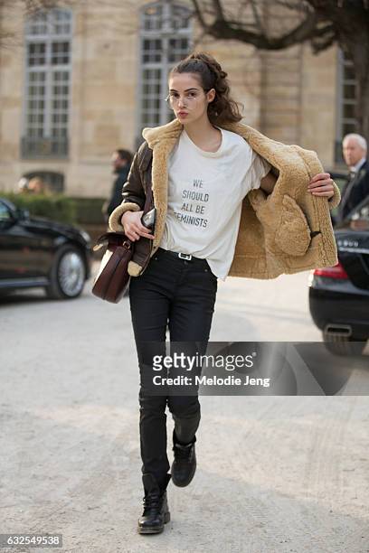 Camille Hurel wears a "We Should All Be Feminist" Dior shirt at the Dior Couture show at Musee Rodin on January 23, 2017 in Paris, France.