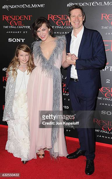 Actress Milla Jovovich, husband director Paul W.S. Anderson and daughter Ever Anderson arrive at the Los Angeles premiere "Resident Evil: The Final...