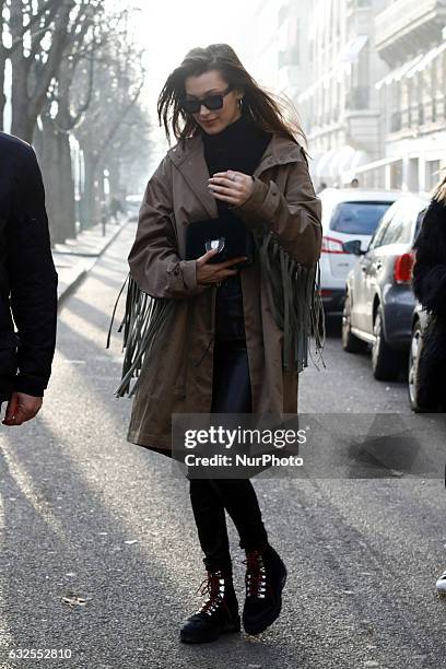 Bella Hadid seen leaving her hotel and does some shopping at Yves Saint Laurent store in Paris. On January 23, 2017