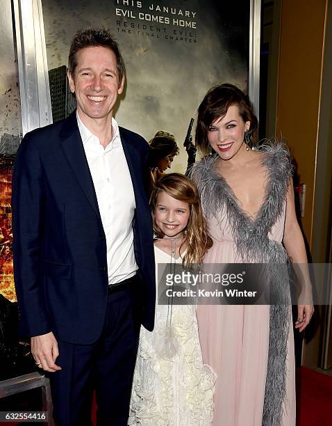 Actress Milla Jovovich, her husband writer/director Paul W.S. Anderson and their daughter actress Ever Gabo Anderson arrive at the premiere of Sony...