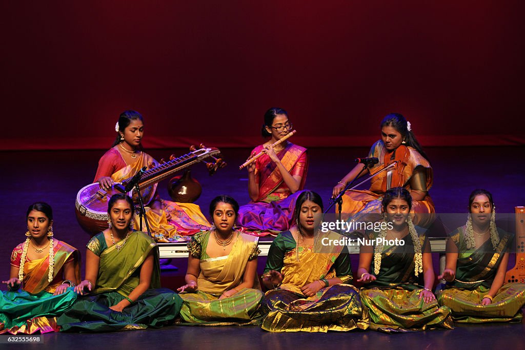 Tamil youth perform during the Thai Pongal festival