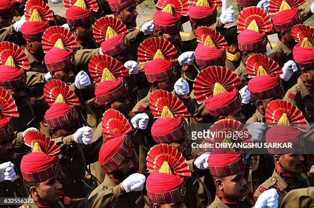 Indian members of the Border Security Force march during a full dress rehearsal for the forthcoming Republic Day parade in Kolkata on January 24,...
