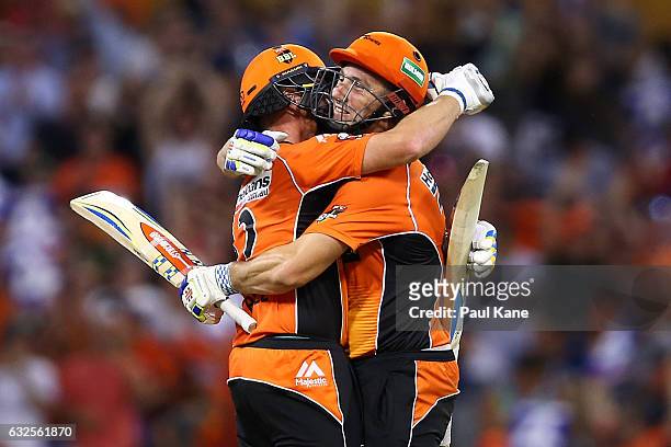 Ian Bell and Shaun Marsh of the Scorchers celebrate winning the Big Bash League match between the Perth Scorchers and the Melbourne Stars at the WACA...