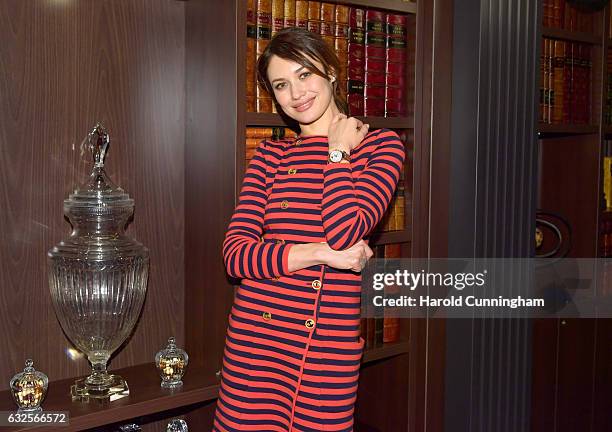 Olga Kurylenko visits the IWC booth during the launch of the Da Vinci Novelties from the Swiss luxury watch manufacturer IWC Schaffhausen at the...