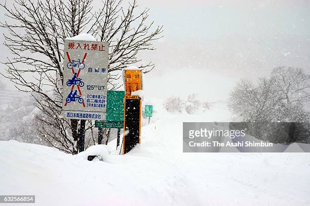 Snow-covered Yonago Expressway Hiruzen Interchange is seen on January 24, 2017 in Maniwa, Okayama, Japan. Heavy snow trapped hundreds of vehicles in...