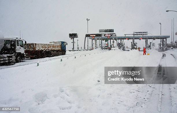 Photo taken Jan. 24, 2017 shows a tollgate on Yonago Expressway, closed due to heavy snow, in Yonago, Tottori Prefecture in western Japan.