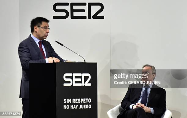Barcelona President Josep Maria Bartomeu speaks next to Real Madrid President Florentino Perez during the presentation of a PRISA and UNESCO awarness...