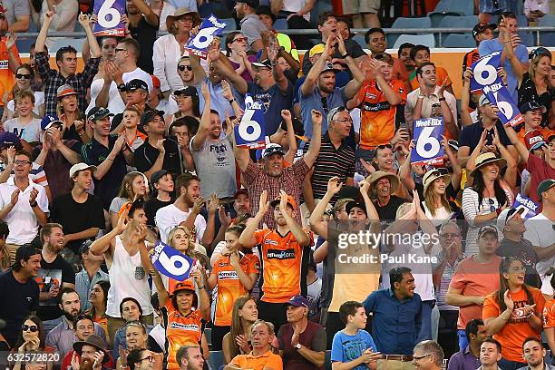 Spectators celebrate a six during the Big Bash League match between the Perth Scorchers and the Melbourne Stars at the WACA on January 24, 2017 in...