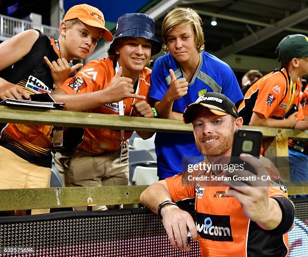 Ian Bell of the Scorchers poses with fans after the Big Bash League match between the Perth Scorchers and the Melbourne Stars at the WACA on January...