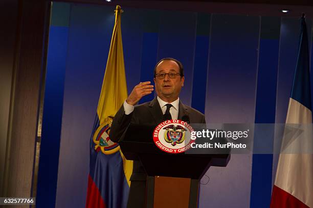 French President Francois Hollande speaks during a press conference offered along with Colombian President Juan Manuel Santos at Narino Palace in...