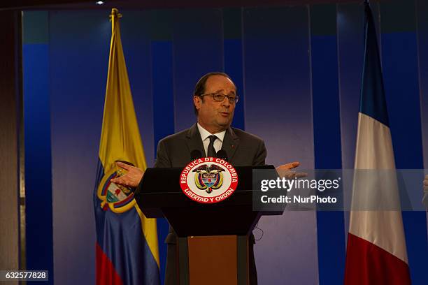 French President Francois Hollande speaks during a press conference offered along with Colombian President Juan Manuel Santos at Narino Palace in...