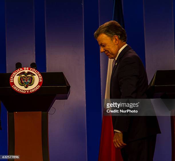 Colombian President Juan Manuel Santos meet his French counterpart Francois Hollande during a cultural event as part of the Colombia-France year at...