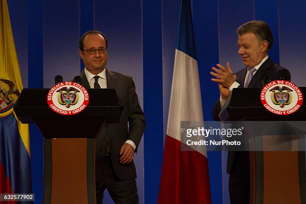 Colombian President Juan Manuel Santos next to his French counterpart Francois Hollande during a cultural event as part of the Colombia-France year...