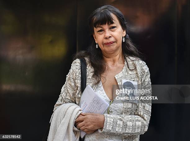 Yanette Bautista, relatives of a victim of the Colombian armed conflic, arrives for a meeting with French President Francois Hollande at French...