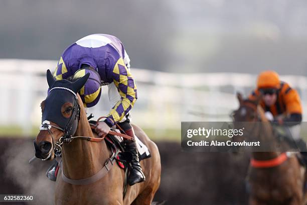 Sam Twiston-Davies riding Romain De Senam look for any danger as they clear the last to win The Dick Christian Novices' Steeple Chase at Leicester...