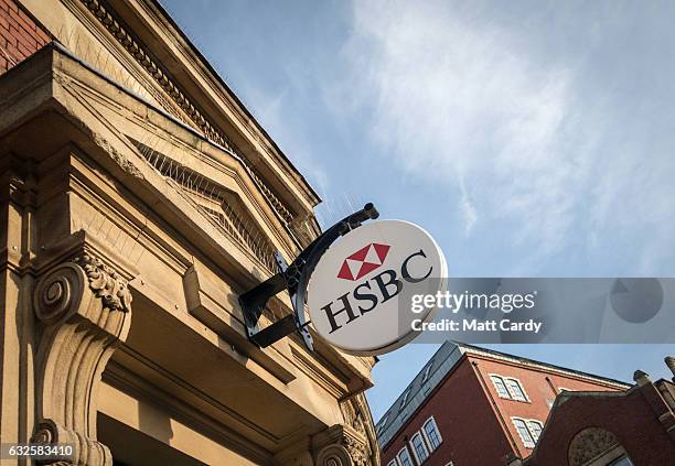 The HSBC logo is seen outside a branch of the bank on January 24, 2017 in Bristol, England. High street lender HSBC has announced it is to close a...