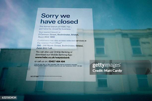 Notice of closure is displayed in a window of a closed branch of the HSBC bank on January 24, 2017 in Bristol, England. High street lender HSBC has...