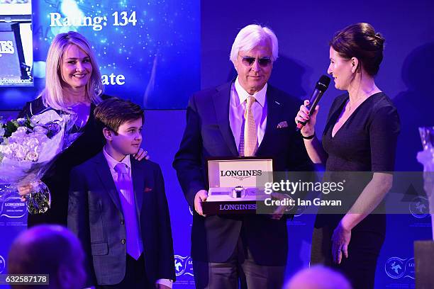 Bob Baffert receives the Longines Worlds Best Horse Award from with Jill Baffert , Bode Baffert and Liz Price during the Longines Awards at...
