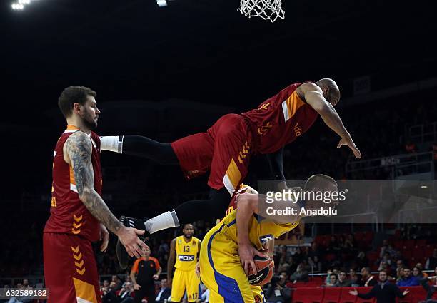 Vlademir Micov and Alex Tyus of Galatasaray Odeabank in action against Colton Iverson of Maccabi Fox Tel Aviv during the Turkish Airlines Euroleague...