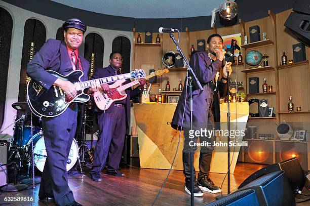 Musical artist SaRon Crenshaw and singer/songwriter Usher perform onstage during the Chivas Regal Ultis Hosted Celebration Honoring Adam and Scooter...