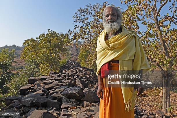 Sukhdev Maharaj poses for the photograph by standing on the Great wall of raisen on January 8, 2017 in Raisen, India. History buffs are calling it...