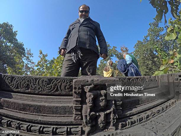 Vinod Tiwari-Member of Itihas Sankalan Samiti looks at the ancient remains found in jungle at Raisen on January 8, 2017 in Raisen, India. History...