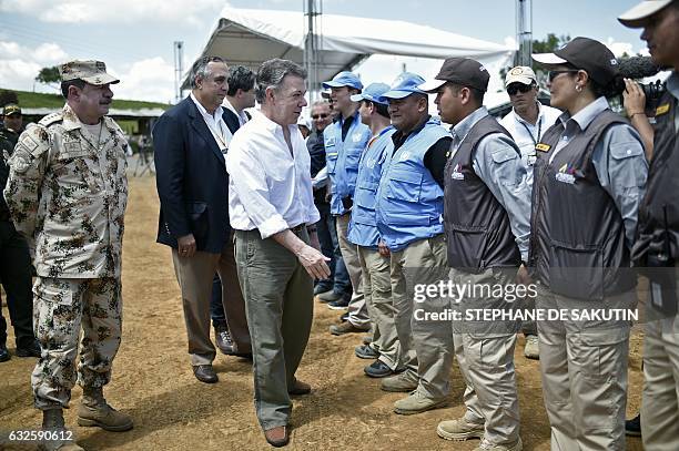 Colombian President Juan Manuel Santos greets United Nations delegates and members of the Monitoring and Verification Body -government delegates and...