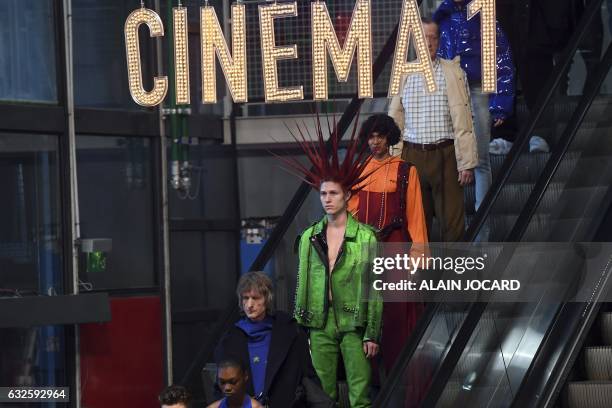 Model presents a creation for Vetements during the 2017 spring/summer prêt-à-porter collection on January 24, 2017 in Paris. / AFP PHOTO / ALAIN...