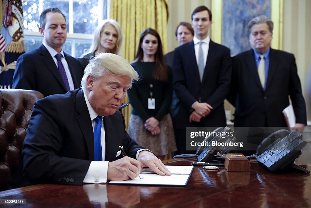 President Trump Signs Executive Order In The Oval Office