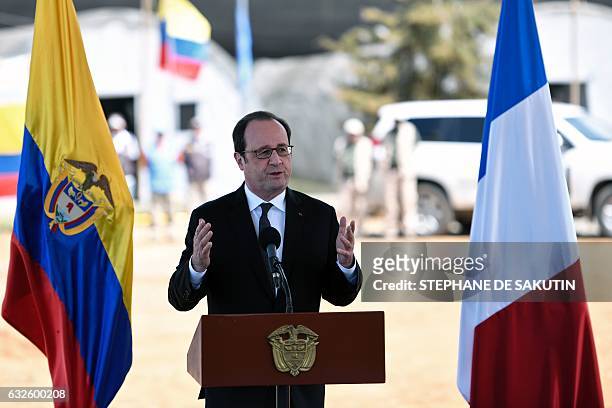 French President Francois Hollande delivers a joint press conference with Colombian President Juan Manuel Santos in Caldono, Valle del cauca...