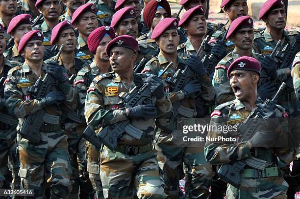 Indian members of the Parachute Regiment march during the full dress resheashal Republic Day parade on Red Road on January 23, 2017 in Kolkata,...