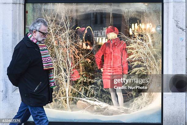 Passer-by near Pajaro shop, in Krakow's city center. On Tuesday, 24 January 2017, in Krakow, Poland.