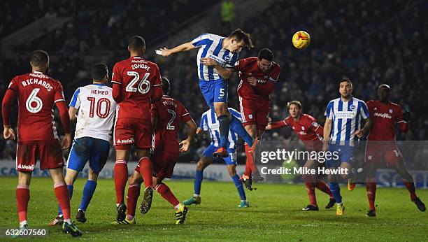 Lewis Dunk of Brighton and Hove Albion heads a chance wide during the Sky Bet Championship match between Brighton & Hove Albion and Cardiff City at...