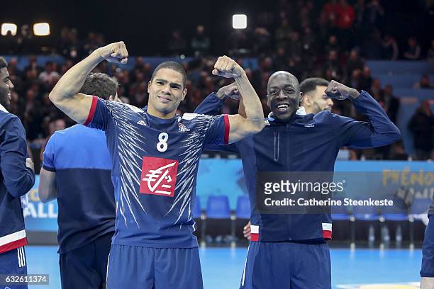 Daniel Narcisse and Olivier Nyokas of France are celebrating the victory of the 25th IHF Men's World Championship 2017 Quarter Final match between...