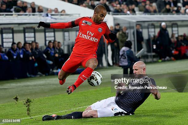 Lucas Moura of Paris Saint Germain and Nicolas Pallois of Bordeaux in action during the Semi Final League Cup match between Bordeaux and Paris Saint...