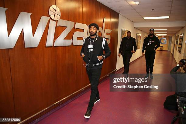 John Wall of the Washington Wizards enters the arena before the game against the Boston Celtics on January 24, 2017 at Verizon Center in Washington,...